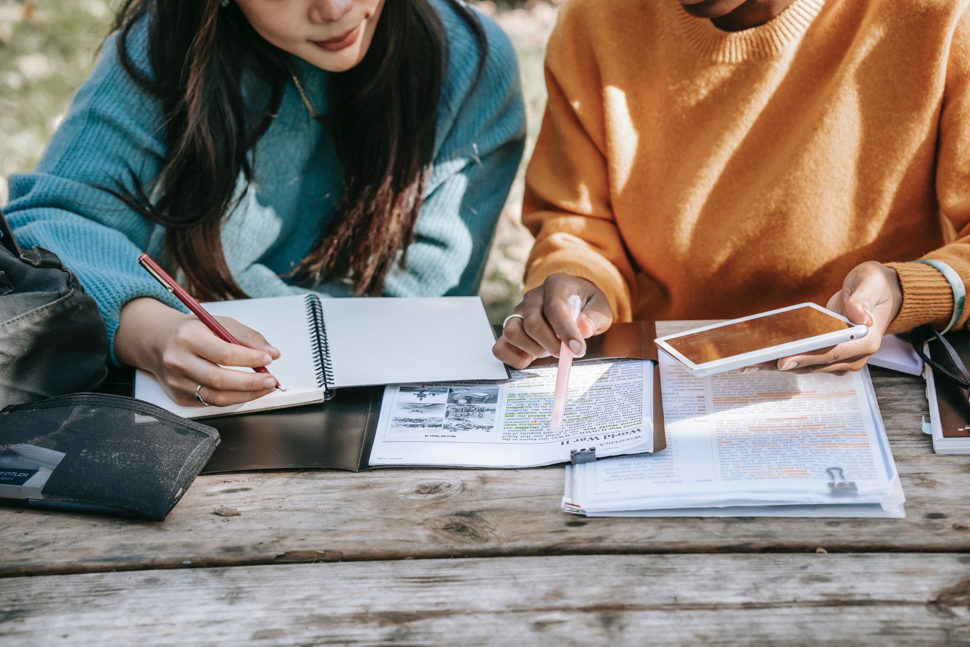 Students studying with notebooks